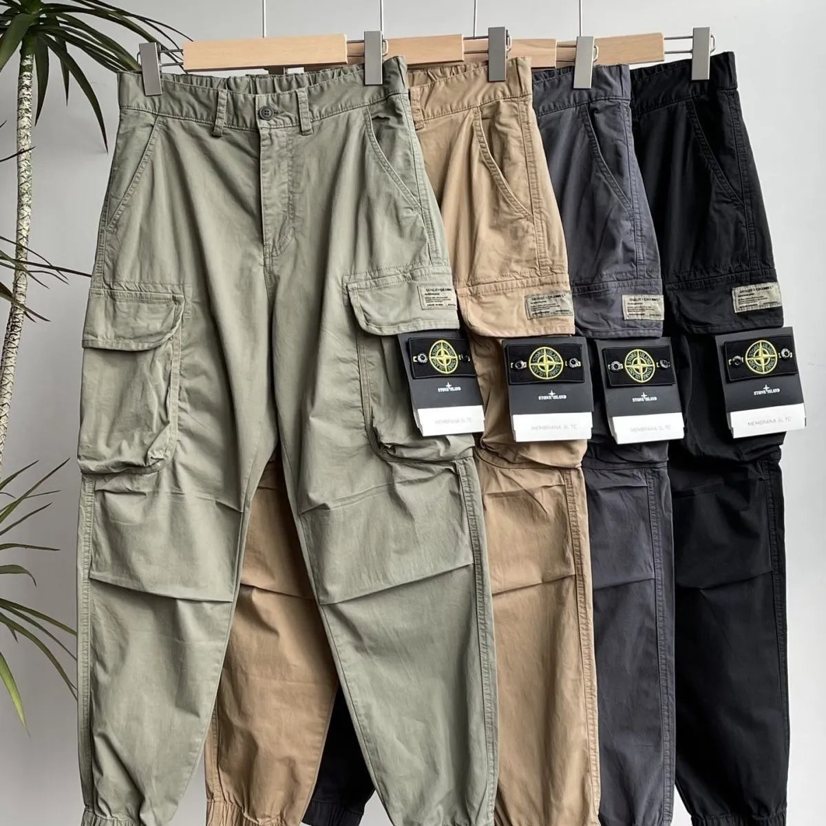 Autumn and winter Stone stone emblem new workwear pants men’s thin side pocket cuff casual trousers INS trend